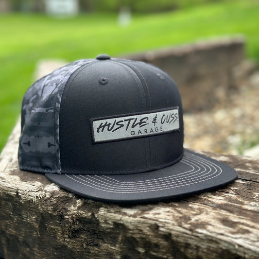 Hustle & Cuss Garage Camo Snap Back Hat